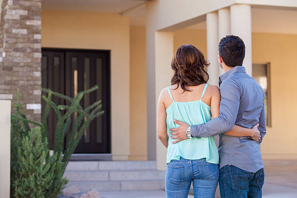 istock Looking at their brand new house 179150887