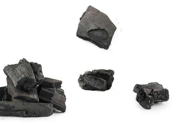 istock Black oak coal isolated on white background. 1791510071