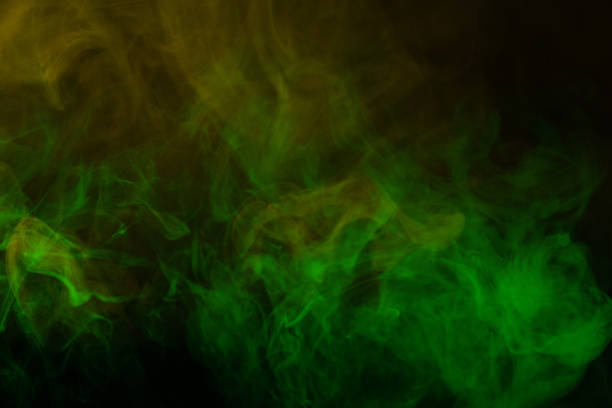 istock Yellow steam on a black background. 1791510074