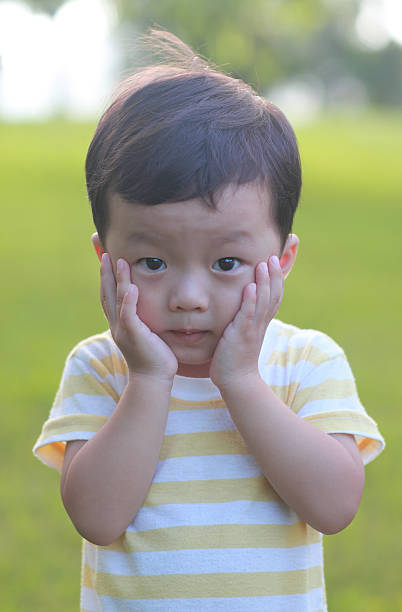 istock Cute children playing in the park 179155319