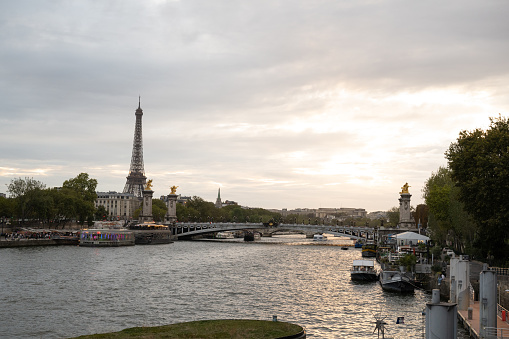 A view of the Eiffel Tower along the River Seine in Paris during Sunset.