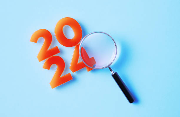 istock Magnifier And  2024 On Blue Background 1791568466