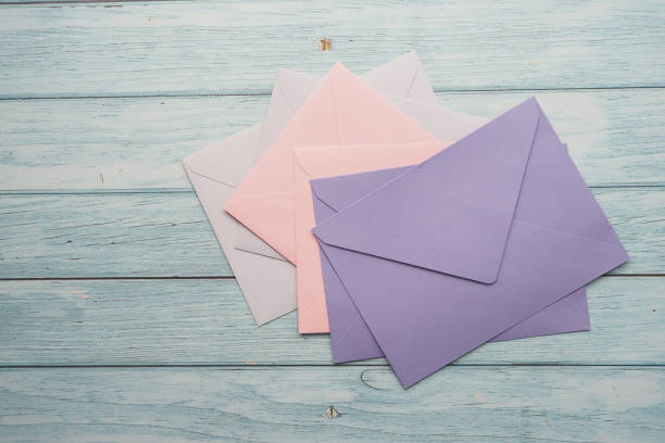 istock colorful envelopes on wooden table 1791592371