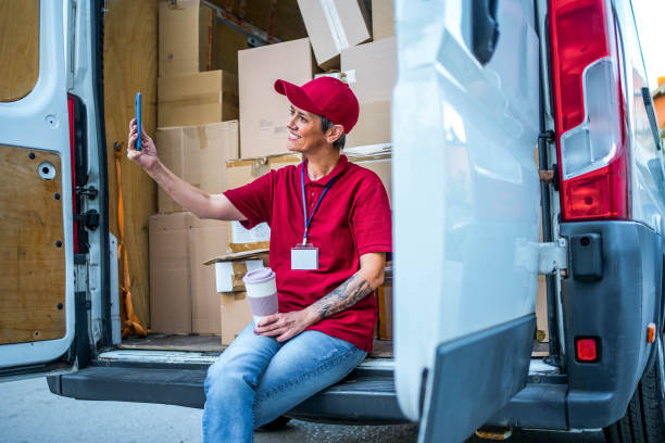 istock Delivery woman taking selfies 1791595802