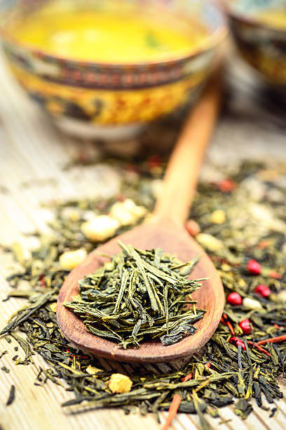 chá verde - tea leaves chinese tea green tea leaf - fotografias e filmes do acervo