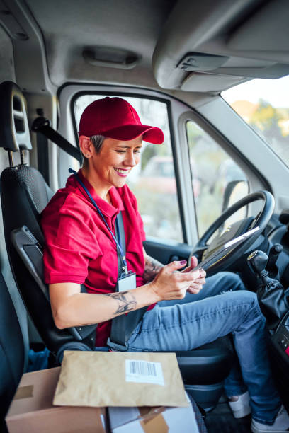 istock Delivery woman checking orders on digital tablet 1791596882