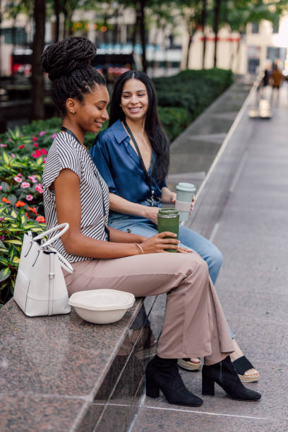 istock Office workers sitting outdoors to enjoy their lunch break 1791603022