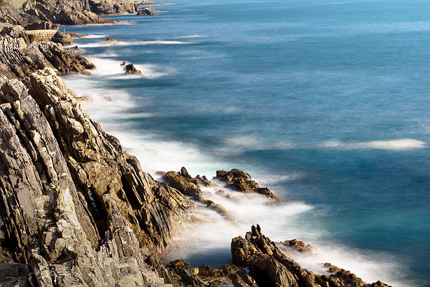 Foaming sea on the cliff stock photo