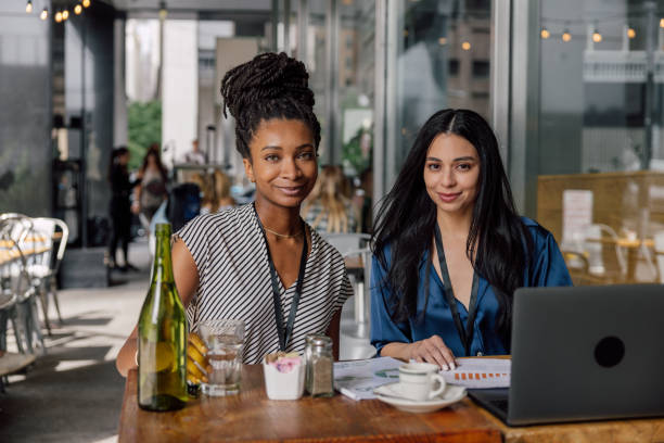 istock Businesswomen working during lunch break in a restaurant 1791620108