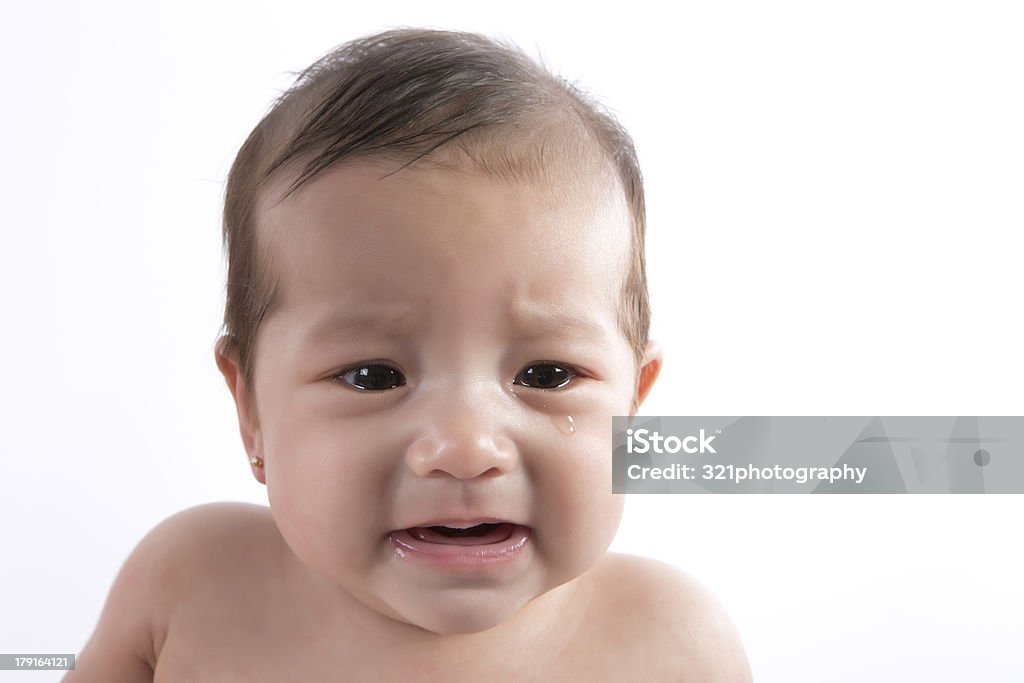 Baby Crying Mixed baby.  Father is asian and mother is caucasian. 12-17 Months Stock Photo