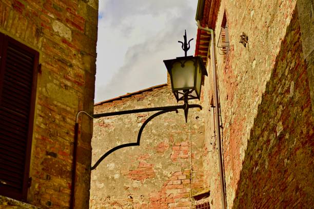 Brick wall texture under the spotlight in Tbilisi old street