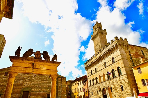 Montepulciano is medieval hilltop town in Tuscany, Italy. Surrounded by vineyards, the Torre di Pulcinella is a clock tower and the Piazza Grande and 14th century Palazzo Comunale.