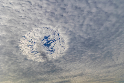 Unusual atmospheric phenomenon in a cloudy sky, Germany, North Rhine-Westphalia