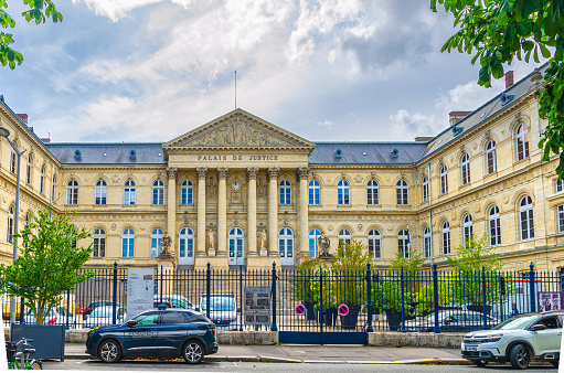 Amiens, France, July 3, 2023: Palais de Justice Cour d'Appel Palace neoclassical architecture style building, view of facade with columns and courtyard, Somme department, Hauts-de-France Region