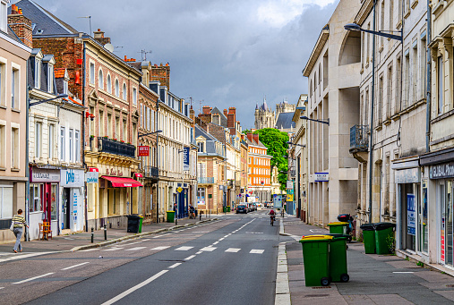 Amiens, France, July 3, 2023: street view of Amiens historical city centre with typical old buildings and stores, Somme department, Hauts-de-France Region, Northern France