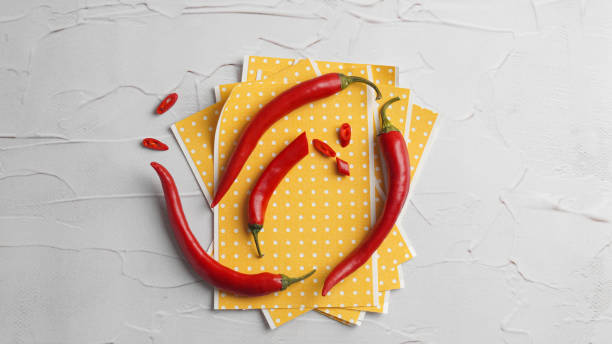 istock Pepper plasters and chili on white textured table, flat lay 1791682510