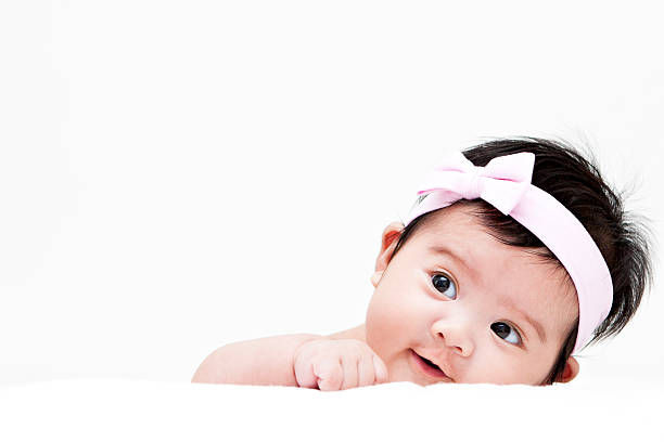 かわいい赤ちゃん olivia - baby people headband portrait ストックフォトと画像