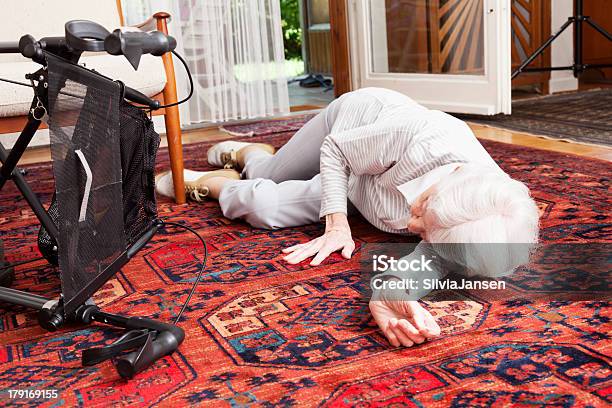 Accident Senior Woman After Fall Lying On Ground Stock Photo - Download Image Now - Falling, Senior Adult, Senior Women