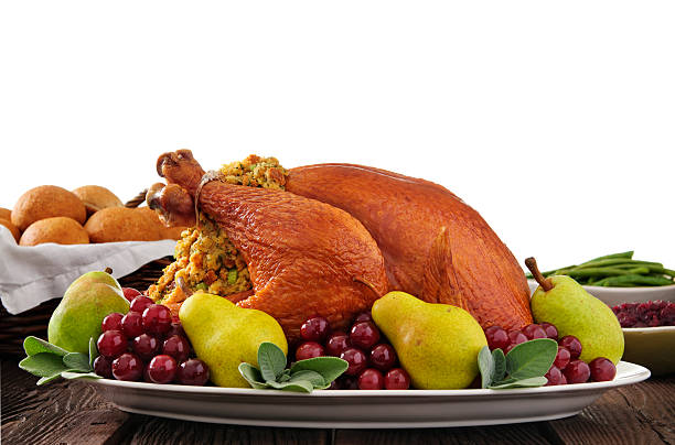 Thanksgiving Turkey Thanksgiving turkey with side items on white background.  Please see my portfolio for other food and holiday related images. sauces table turkey christmas stock pictures, royalty-free photos & images