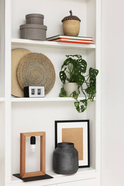 istock Shelves with different decor indoors. Interior design 1791694444
