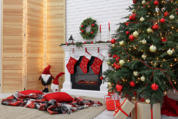 istock Cosy room with tree and fireplace decorated for Christmas. Interior design 1791696042