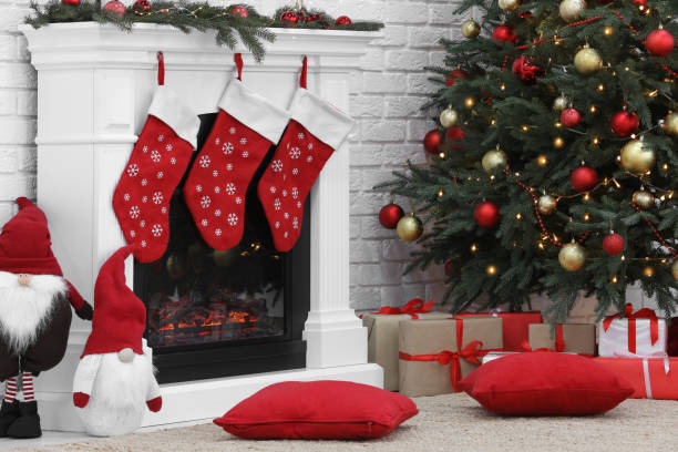 istock Cosy room with tree and fireplace decorated for Christmas. Interior design 1791696054