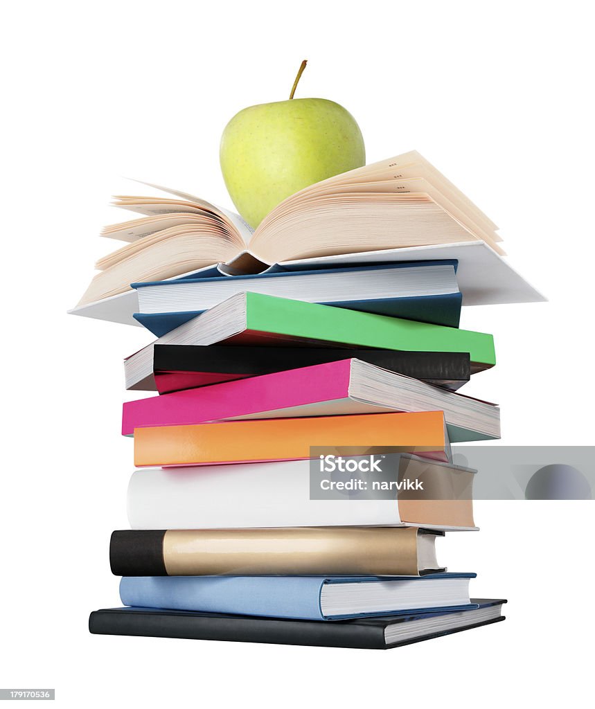 Pila de libros con verde manzana en la parte superior - Foto de stock de Cubierta de libro libre de derechos