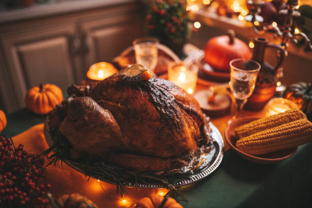 istock Thanksgiving holiday dinner table setting with fall decoration and pumpkins 1791721218