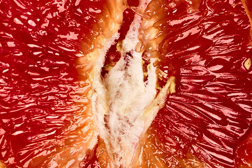 Macro view of a freshly cut grapefruit