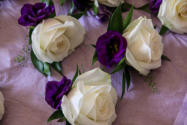 istock White Rose Wedding Buttonhole Flowers 179173572