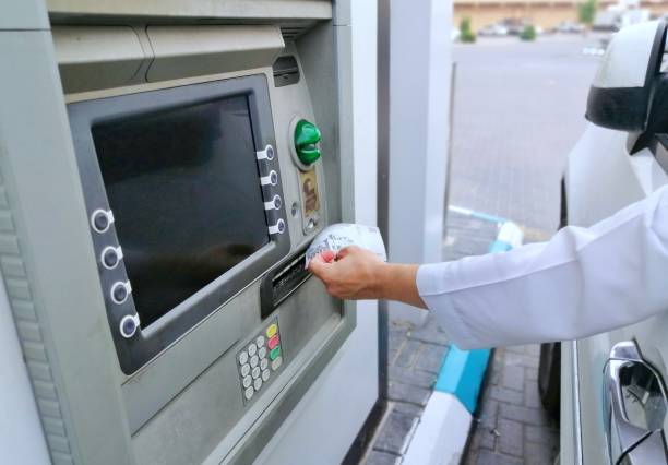 istock A man withdrawing money from the drive through ATM 1791740629
