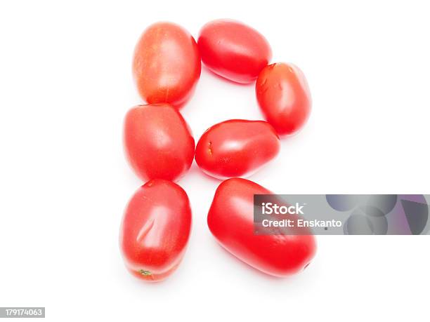 Photo libre de droit de La Lettre De Tomate Sur Fond Blanc banque d'images et plus d'images libres de droit de Aliment - Aliment, Aliments et boissons, Blanc
