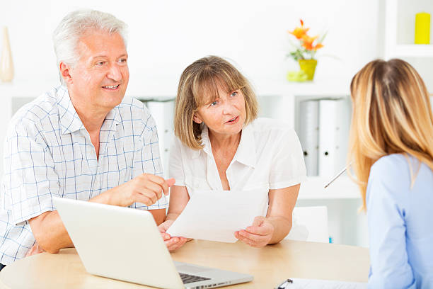 istock Senior Couple Meeting with Financial advisor. 179175100