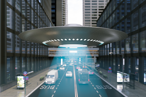 Close-up View Of UFO Hovering Over The City Through The Buildings