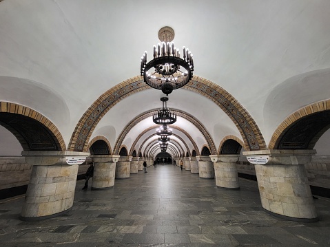 interior of subway station Zoloti Vorota (Golden gates). Interrior of the deep column station. Kyiv, Ukraine - November, 2023.
