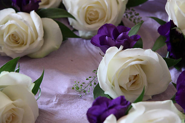 istock White Rose Wedding Buttonhole Flowers 179178223