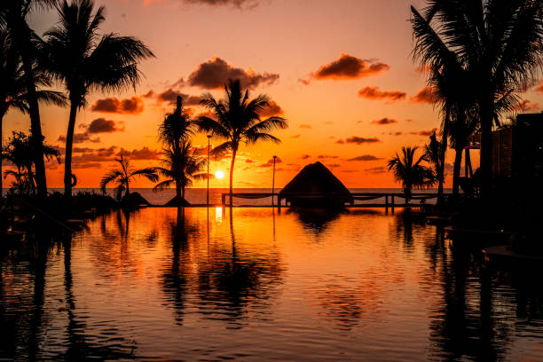 istock Sunrise over the infinity pool at the resort 1791793127