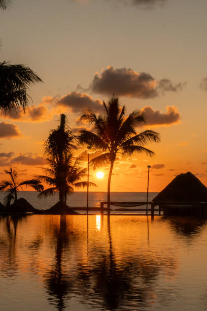 istock Sunrise over the infinity pool at the resort 1791793663
