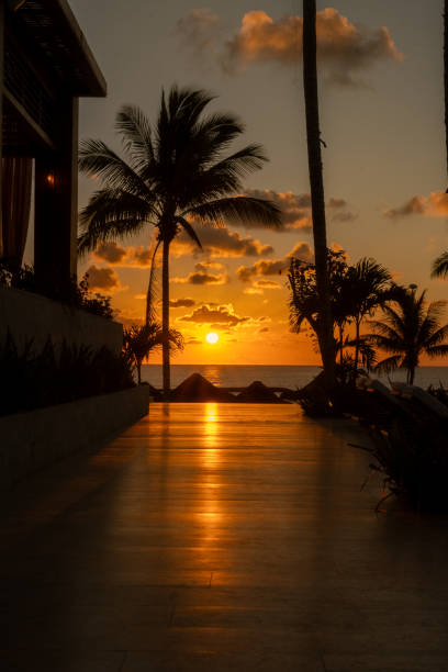 istock Sunrise over the infinity pool at the resort 1791794208