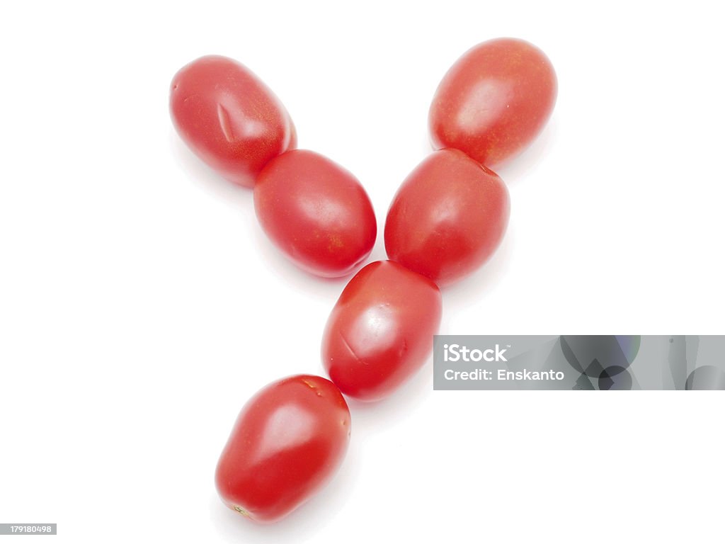 Der Brief von Tomaten auf weißem Hintergrund - Lizenzfrei Alphabet Stock-Foto
