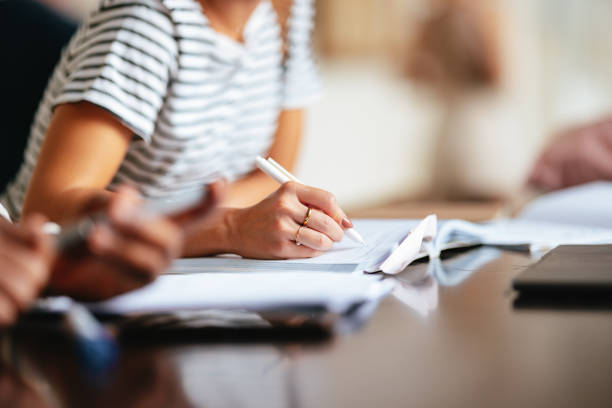 istock An Unrecognizable Beautiful Businesswoman Taking Some Notes 1791810192