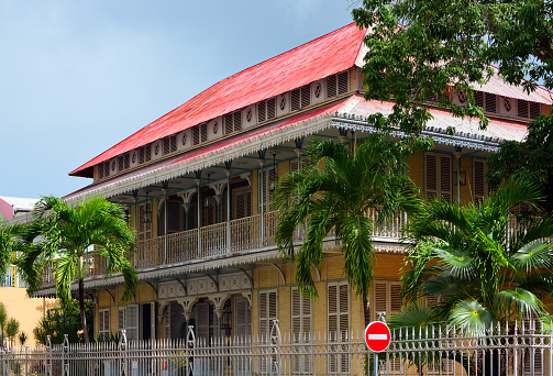 Pointe-à-Pitre, Guadeloupe: Saint-John-Perse Museum (Departmental Museum) - houses a permanent exhibition on Creole costumes and on the poet and diplomat Saint-John Perse (pen name of Alexis Leger), Nobel Prize winner for literature in 1960, whose texts are strongly marked by his time in Guadeloupe - 'Souques-Pagès' villa, where the owners of the Darboussier sugar factory once resided, built in 1880, the building has a metal and brick structure, probably designed as a kit by the Gustave Eiffel workshops for a Louisiana planter. The ship which transported the elements was wrecked in Guadeloupe and the recovered elements were sold at auction - Nozières Street.