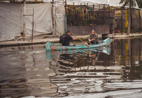 Boats and trajineras on the Xochimilco canals in Mexico City.