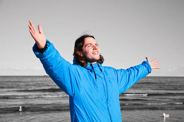 istock Happy man on the beach - b&w background. Overcoming depression 179189269