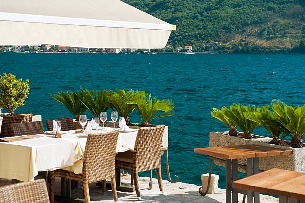 istock restaurant tables on the Mediterranean Sea 179193684