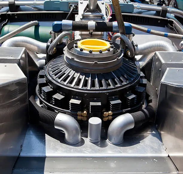 Car engine under the open hood