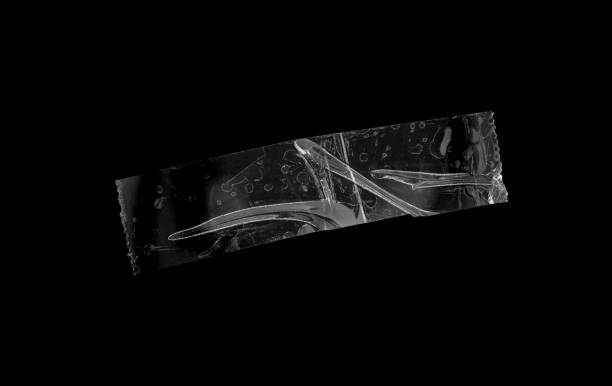 istock adhesive plastic tape isolated on black background 1792017811