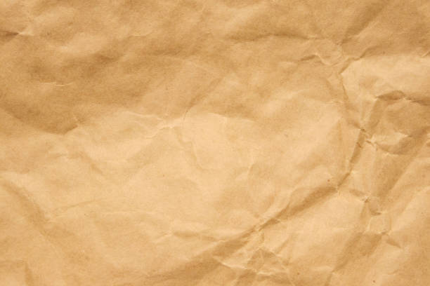 istock Abstract crumpled and creased recycle brown paper texture background 1792021430
