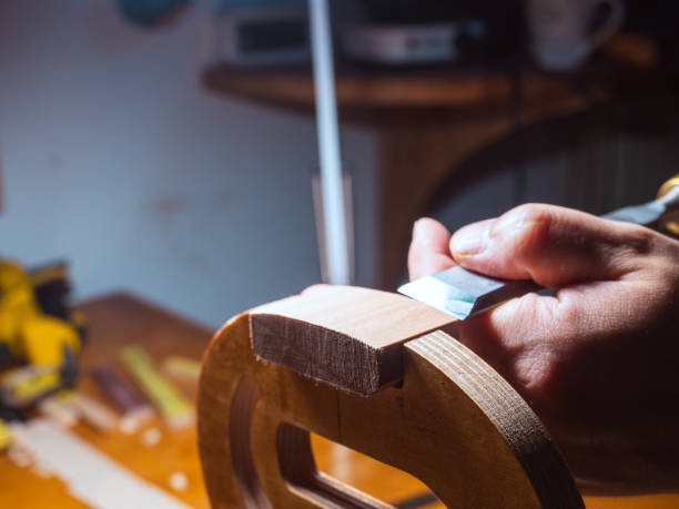istock artisan violin maker luthier working with violin mould for top block, center bot, corner blocks , bend ribs for a new classic handmade violin 1792027433