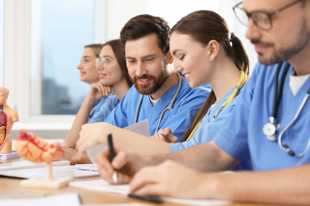 istock Medical students in uniforms studying at university 1792043060